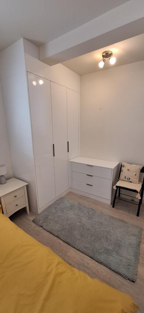 Fitted wardrobe and drawers professionally spray painted white