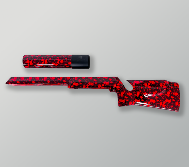 Red hydro dipped rifle stock and suppressor with custom skull pattern