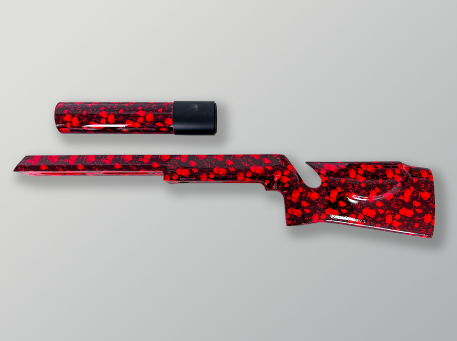 Red hydro dipped rifle stock and suppressor with custom skull pattern